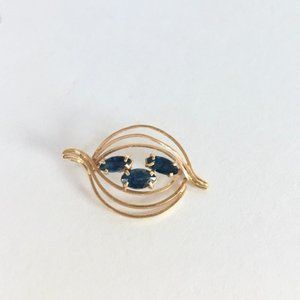 Dark Blue Sapphire Pendant in 18K Gold